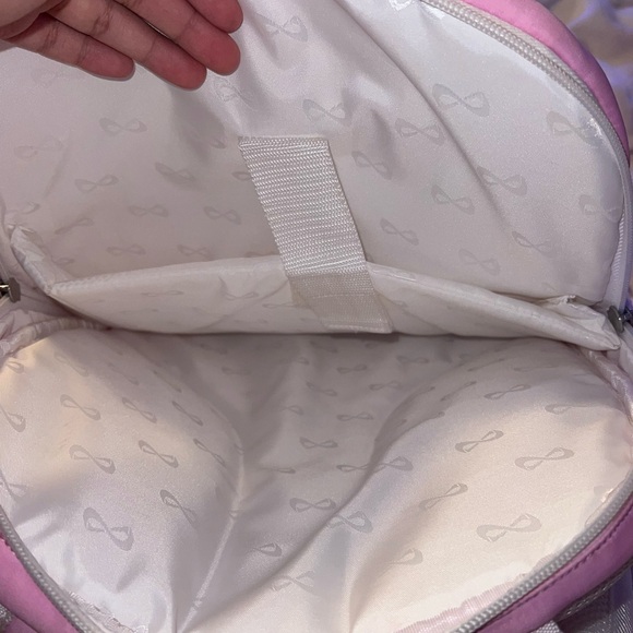 LIGHT PINK NFINITY BACKPACK AS IS - Picture 8 of 11